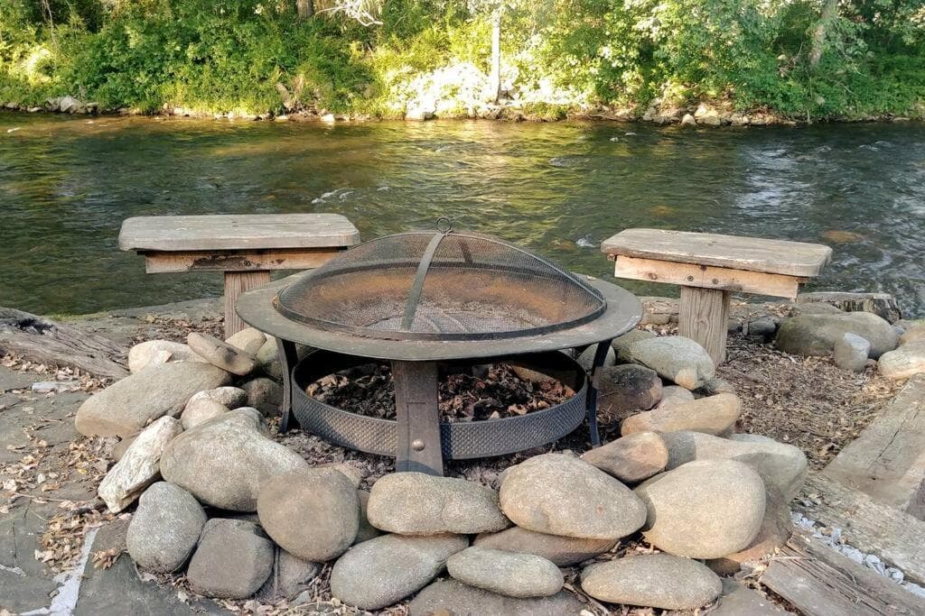 Water's Edge, Covered Porch, Deep Creek as your Backyard Haven, Hot Tub, Pool Table, Fire Pit, Close to Town & Entrance to National Park
