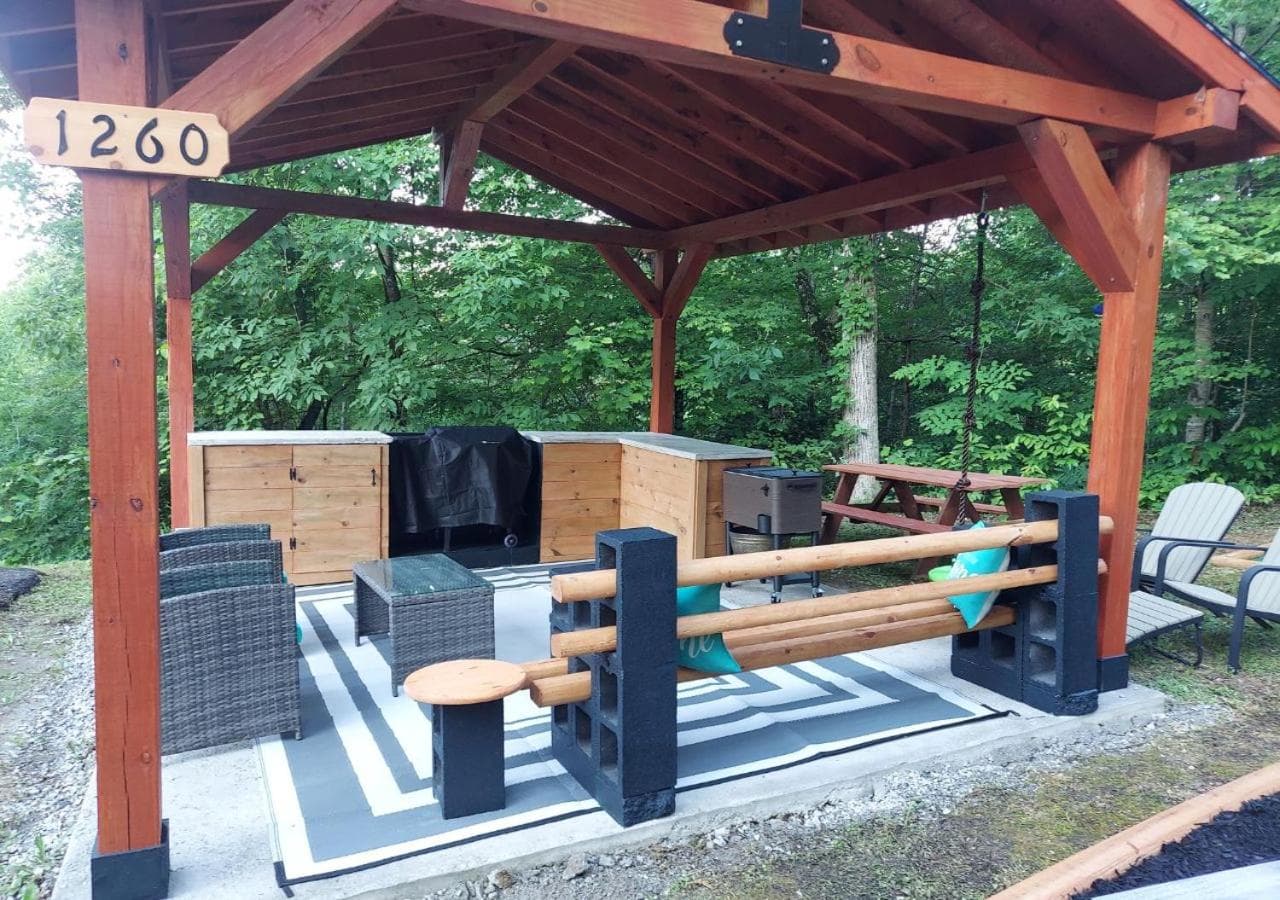 Family Cabin with Hot Tub, Theater, Game Room, Wifi, & Sauna